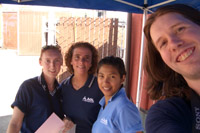 James Ritzman (foreground) with Jen Gladden, ?, and Janet Tinsay doing a promotional modeling gig for AOL (America On-Line)