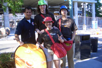 In the sweltering heat, James Ritzman and these others tried handing out samples of new JellyBelly candy.