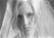 thumbnail black & white photo of a girl in a bridal veil