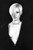 thumbnail black & white photo of a girl in a very low cut dress