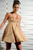 audrey in gold dress