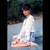 woman in white lace top at beach
