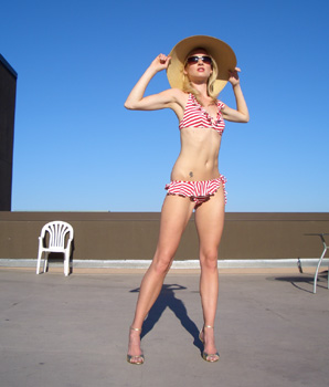 model/actress becky on roof in bikini